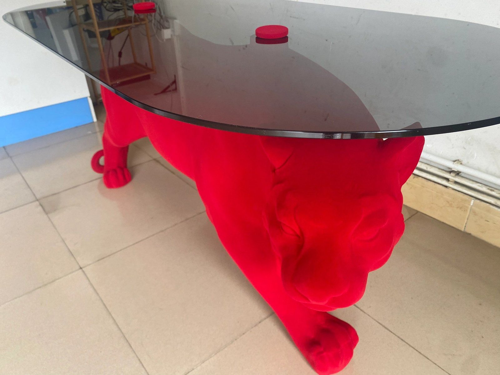 Close view of the panther head below the tabletop