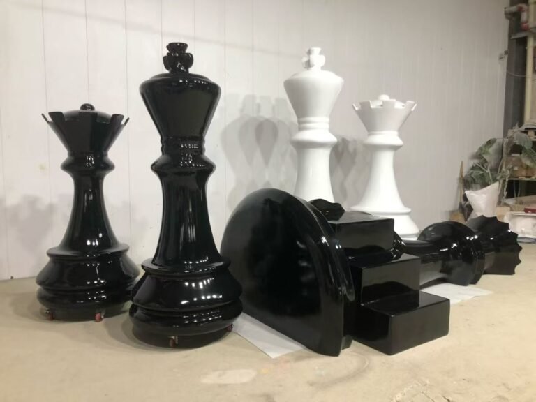 Standing black chess pieces beside a horizontal piece