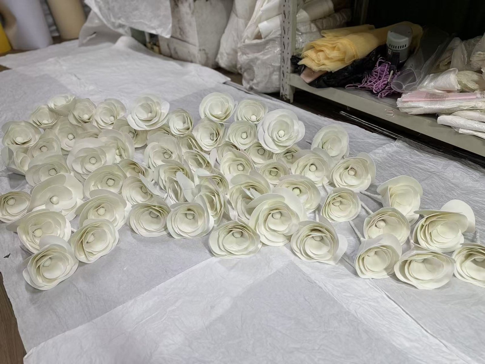 White flower components arranged before assembly