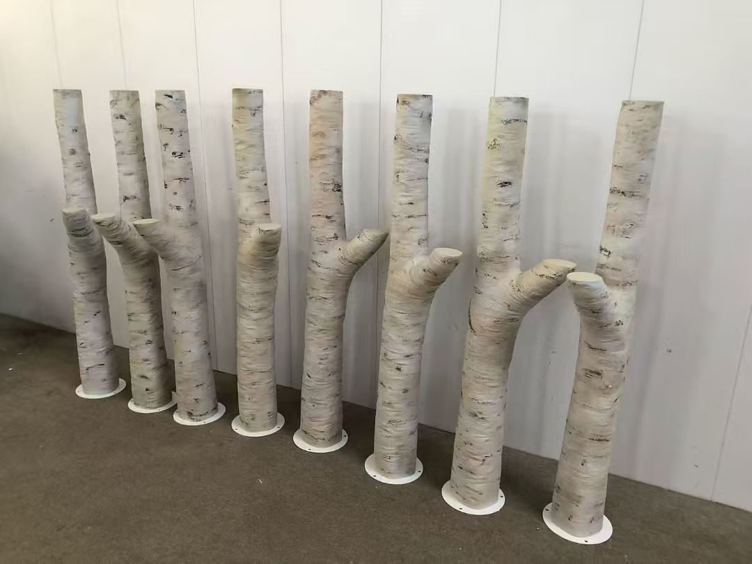 Short birch-style trunks with curved branch details