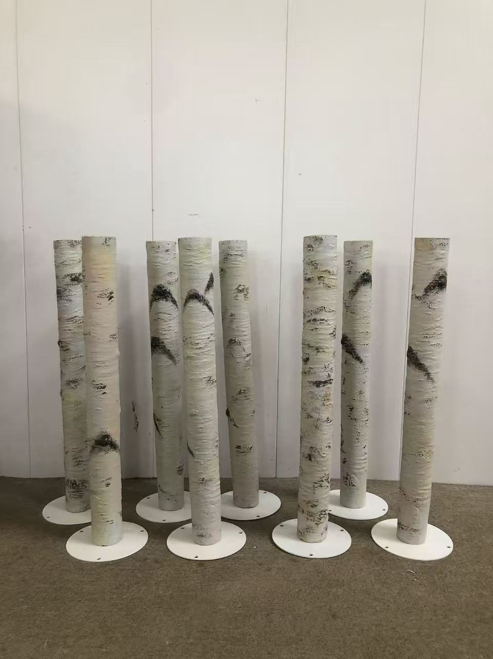 Birch-style display components with white circular bases