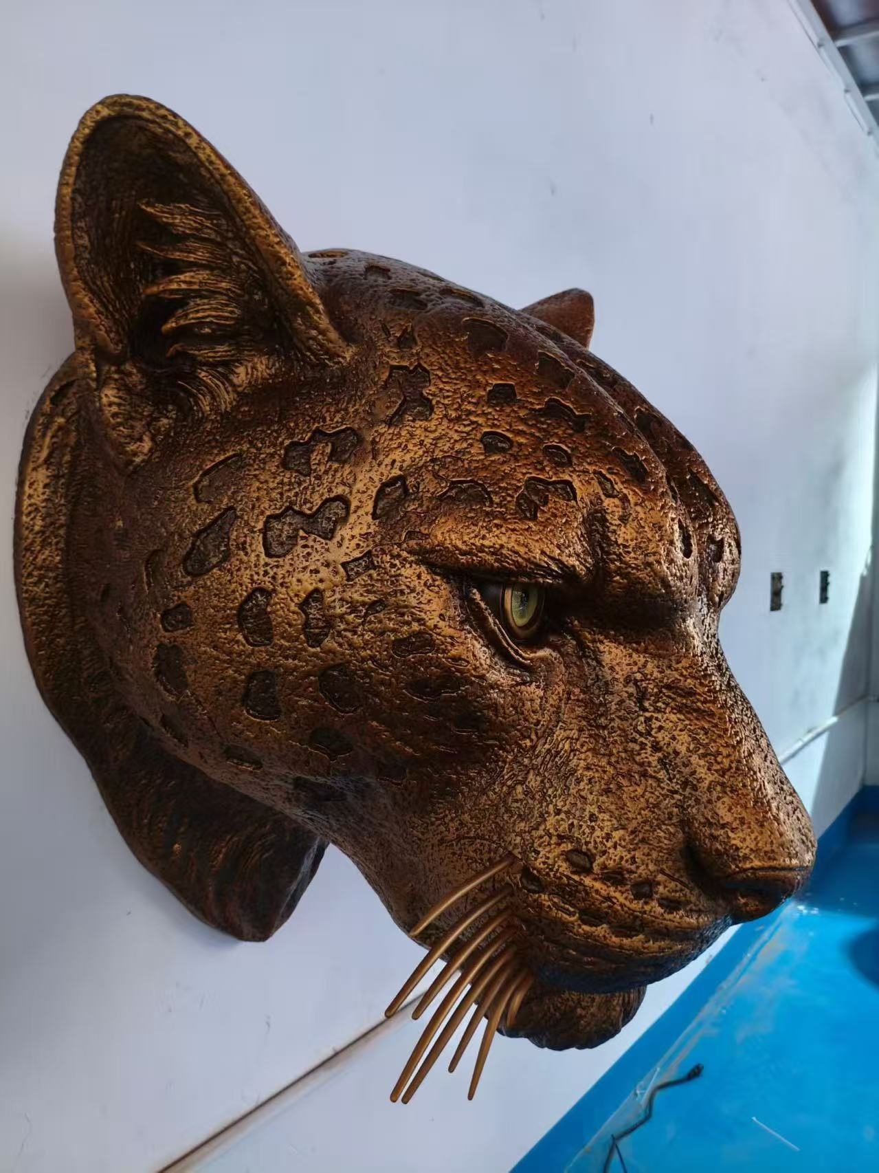 Side view of the leopard head and whisker details