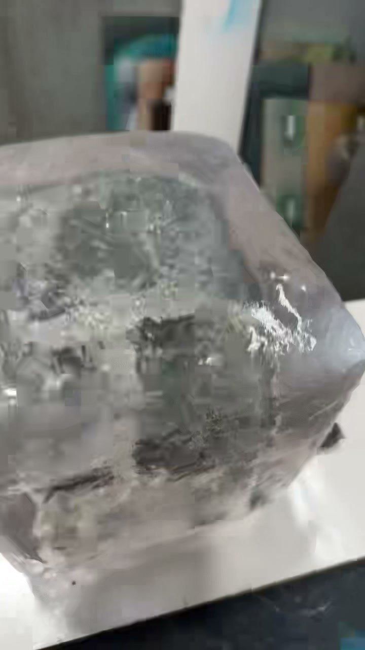 Rounded corners and textured clear surface of a resin ice cube