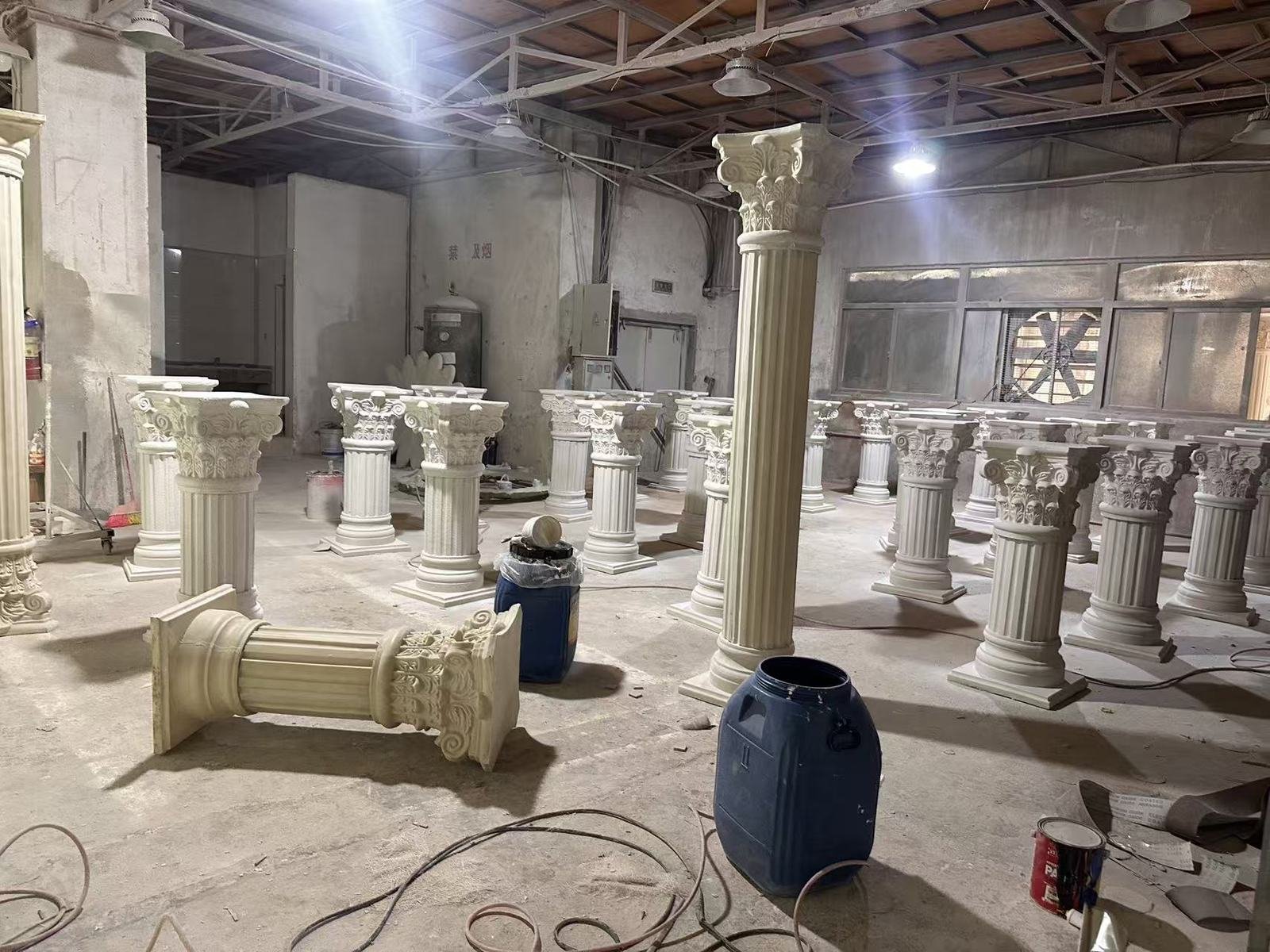 A workshop batch of decorative columns in several heights