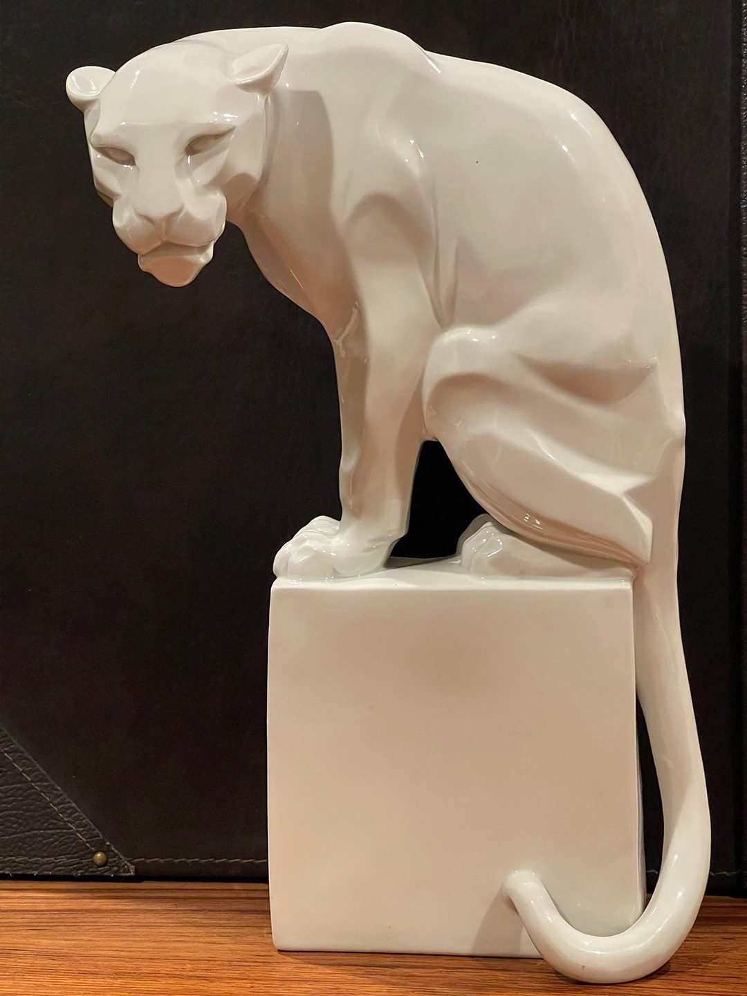 white panther display sculpture on a square plinth